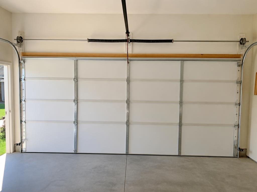 After: completed broken cable repair by A&M Garage Door & Gate Service in Sacramento